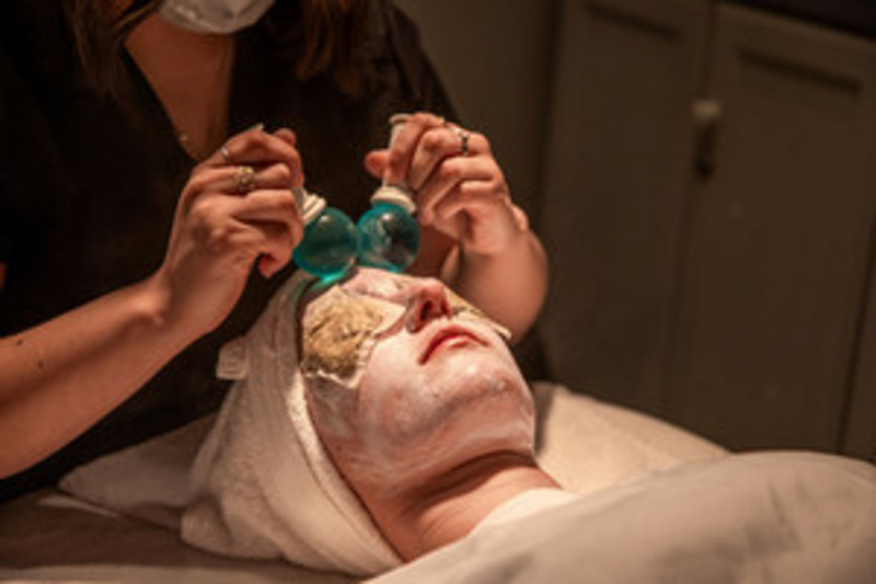 client receiving a facial