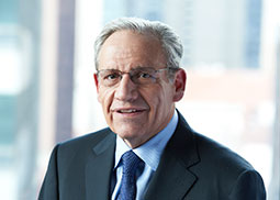 Portrait of journalist Bob Woodward in a professional setting.