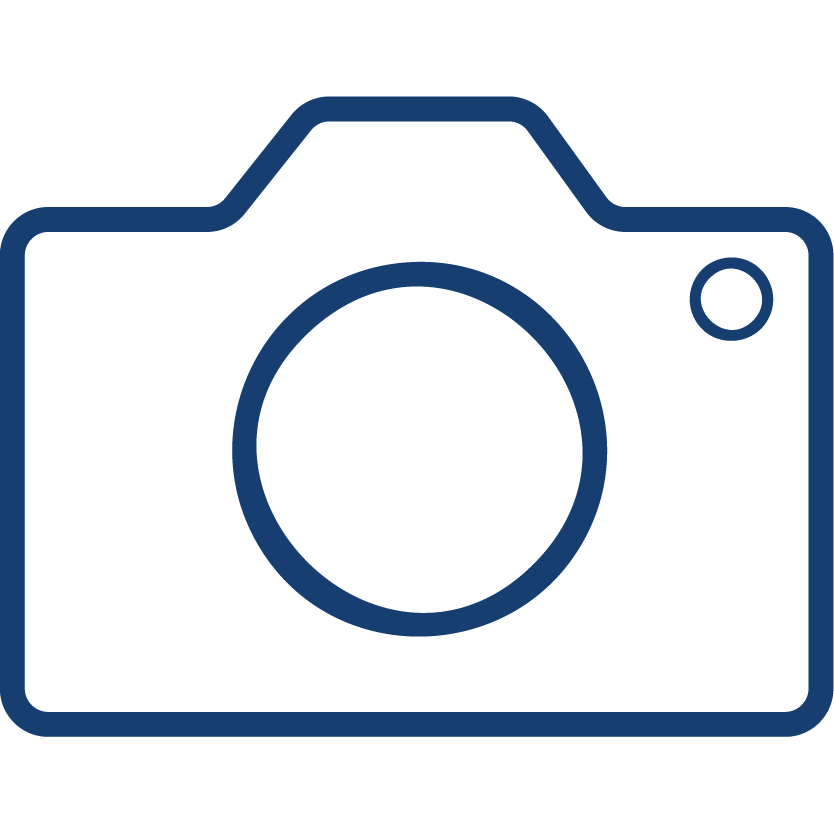 Camera icon in a simple line art style.